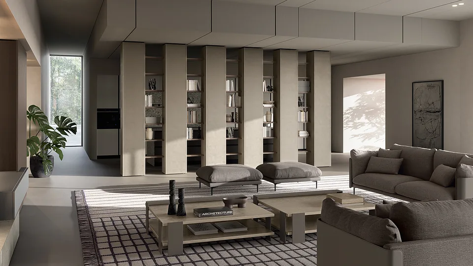 Колонны Colonne terra soffitto, Dall'Agnese, между гостиной и кухней: шесть бежевых колонн до потолка и тёмные деревянные полки с книгами в промежутках